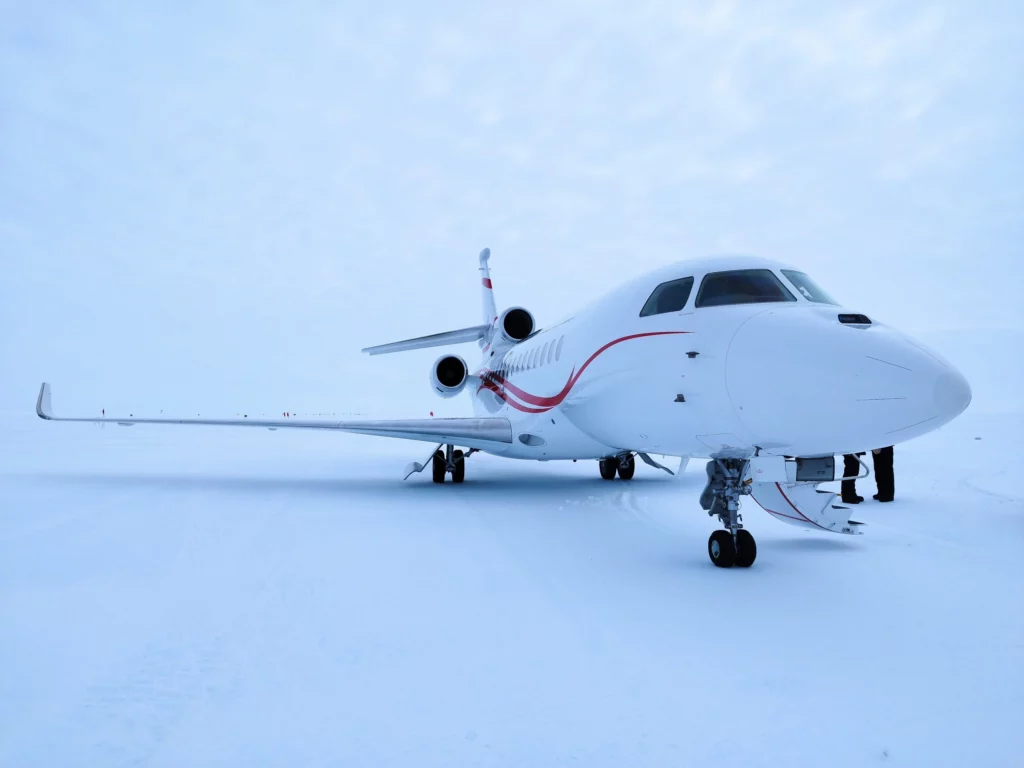 FLYINGGROUP Dassault Falcon parked on ice in Antarctica
